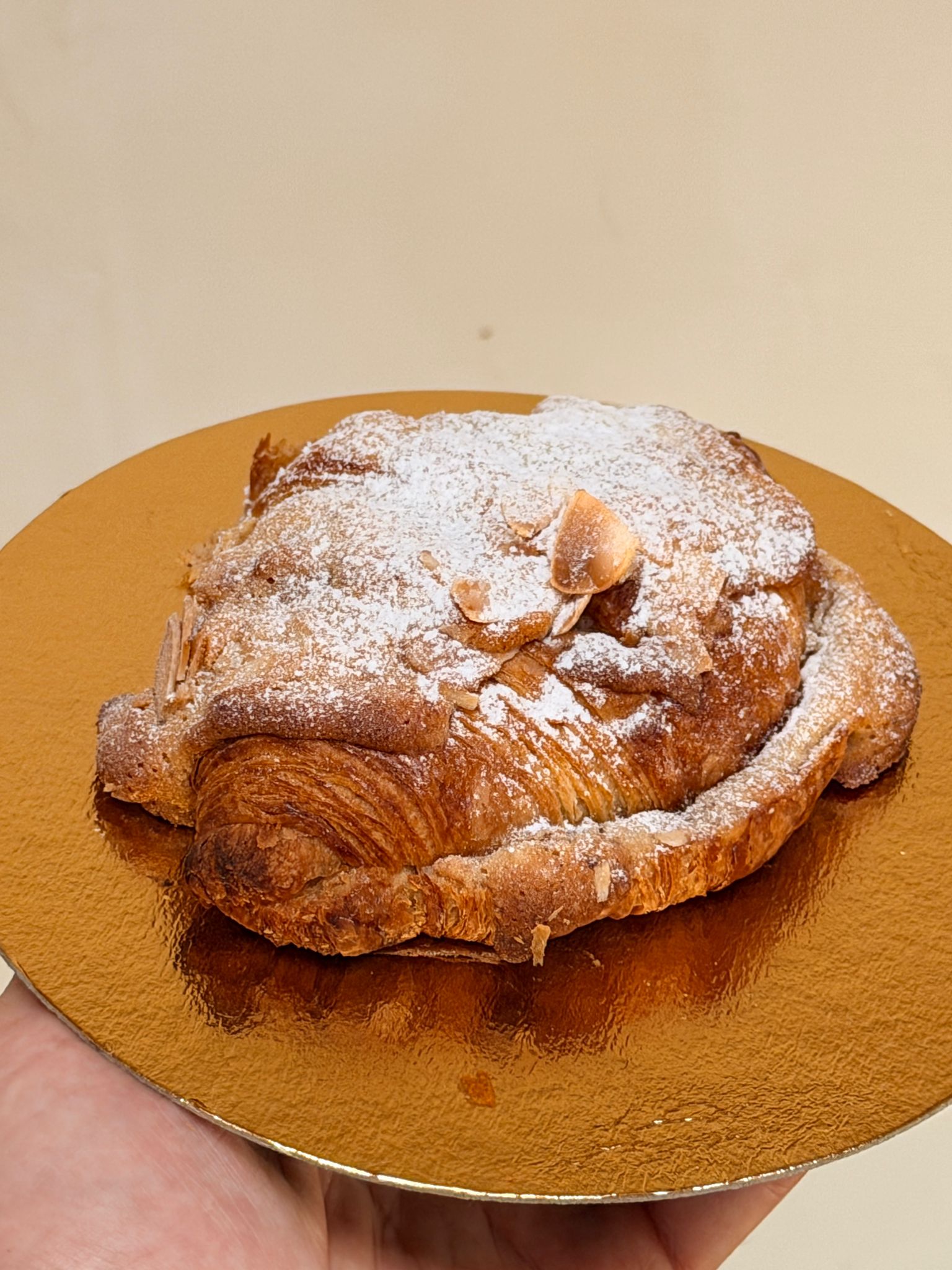 Almond croissant dusted with sugar — Boulangerie D'Amore Nice